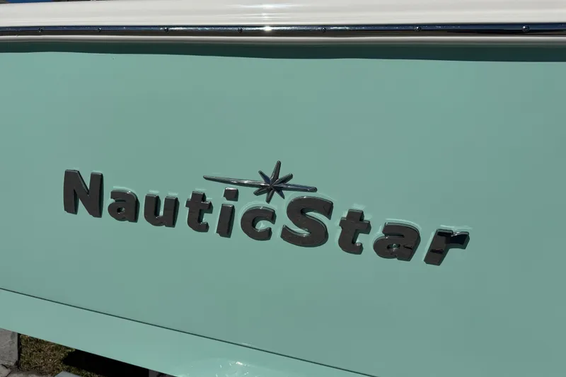Slide: The Image of Close-up of Lenco trim tab on 2022 NauticStar 2602 Legacy boat. - 6