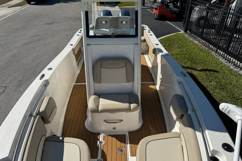 Slide: The Image of 2022 NauticStar 2602 Legacy boat with sleek design and comfortable seating. - 69