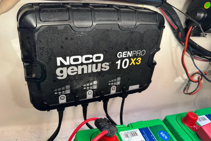 Slide: The Image of NOCO Genius GENPRO 10X3 charger in a 2022 NauticStar 2602 Legacy boat. - 74