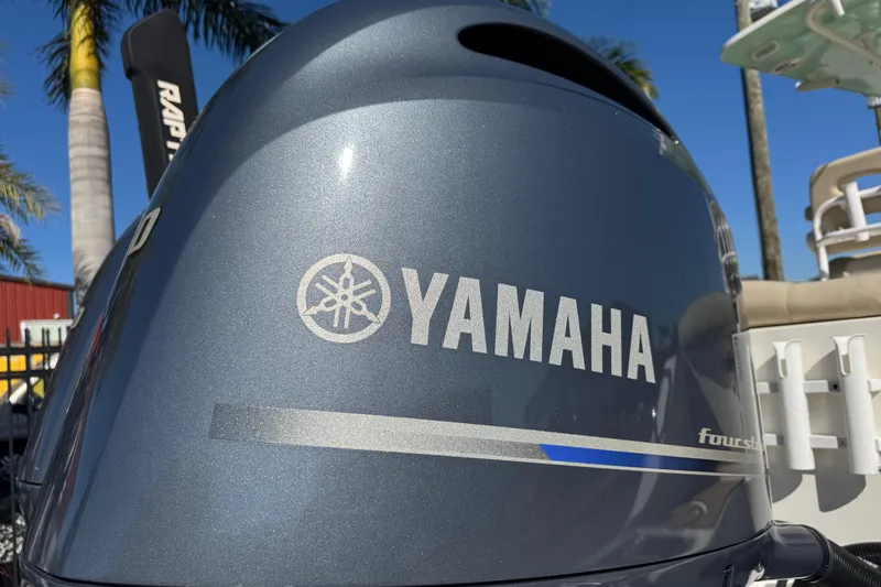 Slide: The Image of 2022 NauticStar 2602 Legacy boat interior with ladder and safety warning. - 8