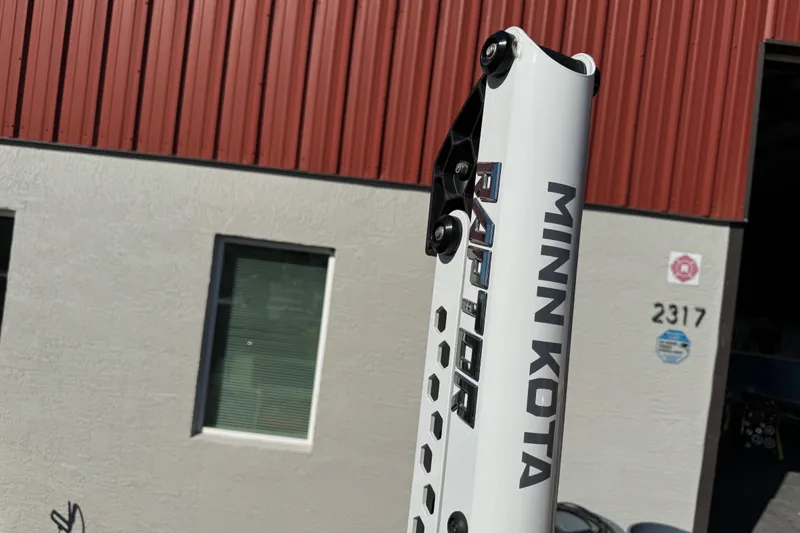 Slide: The Image of Close-up of a 2022 NauticStar 2602 Legacy boat engine mount detail. - 93