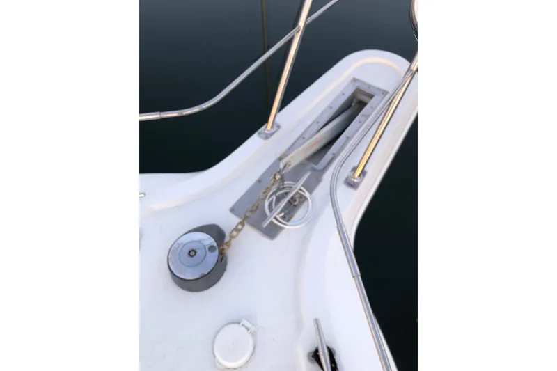Slide: The Image of Bow of 1997 Carver 355 Aft Cabin Motor Yacht with anchor chain and railing. - 10
