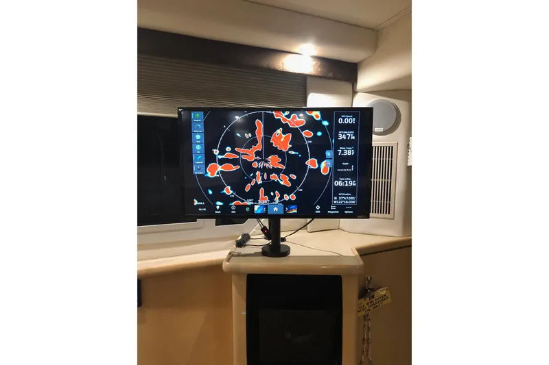 Slide: The Image of Radar display inside 1997 Carver 355 Aft Cabin Motor Yacht, showing navigation data. - 15