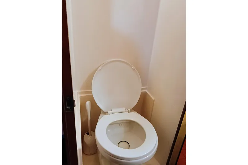 Slide: The Image of Toilet in 1988 Vantare 46' Aft Cabin Wide Body MY yacht bathroom. - 24