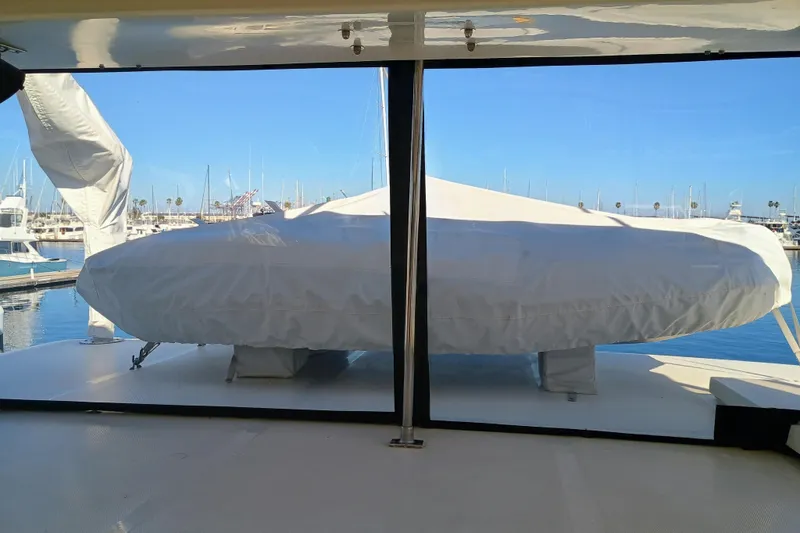 Slide: The Image of 1988 Vantare 46' Aft Cabin yacht dashboard with navigation display and gauges. - 48