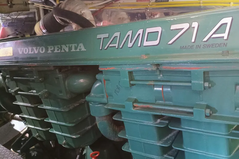 Slide: The Image of Engine room of 1988 Vantare 46' Aft Cabin Wide Body MY with mechanical components. - 51