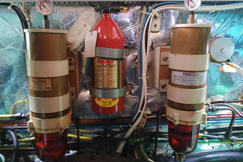 Slide: The Image of Engine room of 1988 Vantare 46' Aft Cabin Wide Body MY with Westerbeke generator. - 54