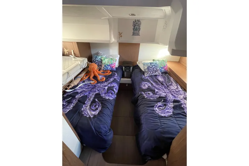 Slide: The Image of Cozy cabin interior of 2018 Benetau Gran Turismo 40 with octopus-themed bedding. - 11