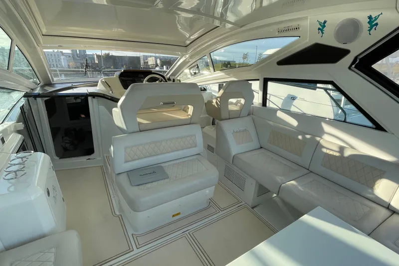 Slide: The Image of Luxurious interior of 2018 Benetau Gran Turismo 40 yacht with elegant seating and modern design. - 17