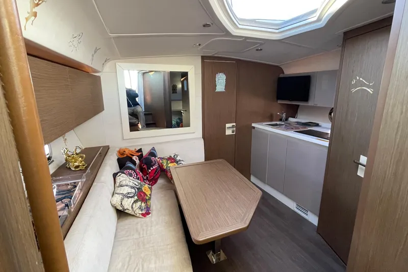 Slide: The Image of Luxurious interior of 2018 Benetau Gran Turismo 40 yacht with modern kitchen and seating area. - 5