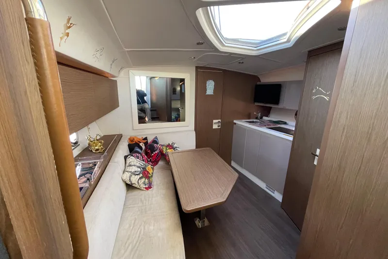 Slide: The Image of Interior of 2018 Benetau Gran Turismo 40 yacht, featuring modern design and cozy seating area. - 7