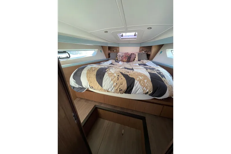 Slide: The Image of Luxurious cabin interior of 2018 Benetau Gran Turismo 40 yacht with cozy bedding. - 8