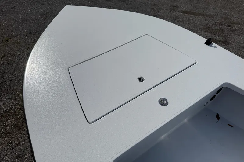 Slide: The Image of 2025 East Cape Vantage boat deck with storage compartment, showcasing sleek design. - 7