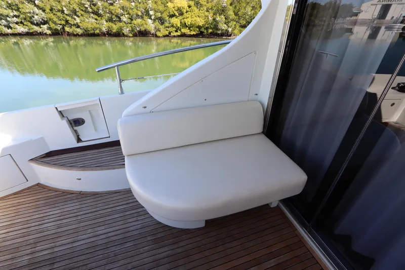 Slide: The Image of Luxury seating on 2007 Azimut 62S yacht deck with scenic water view. - 15