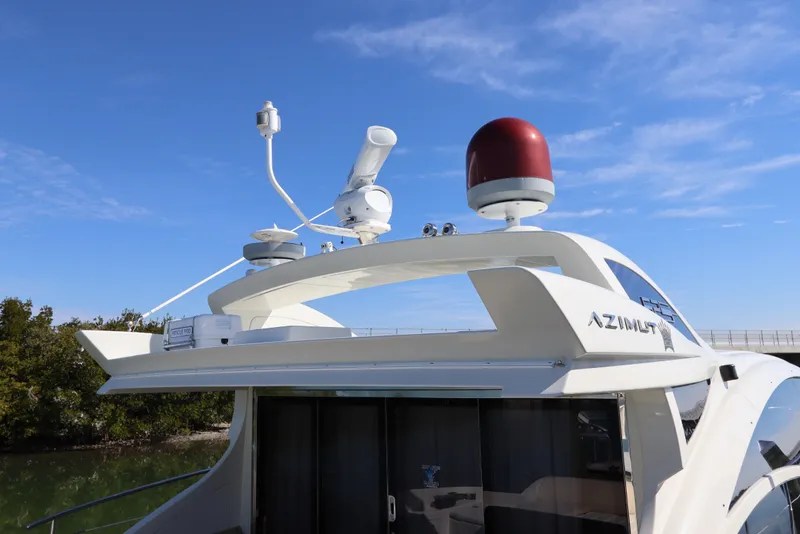 Slide: The Image of 2007 Azimut 62S yacht with radar equipment against a clear blue sky. - 24