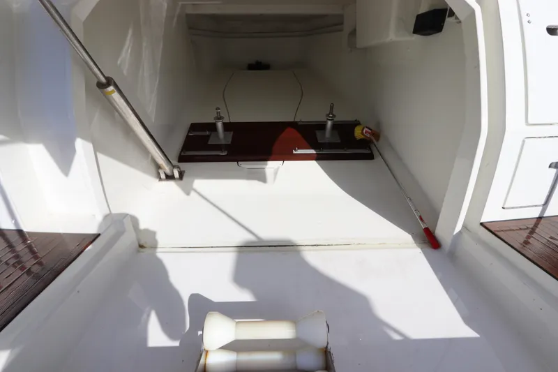 Slide: The Image of 2007 Azimut 62S yacht storage compartment with cleaning tools and equipment. - 3