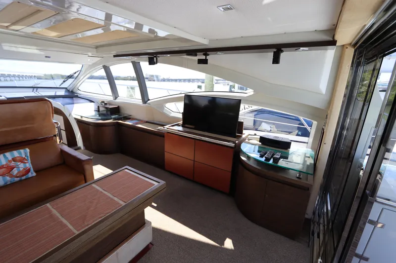 Slide: The Image of Luxurious interior of a 2007 Azimut 62S yacht with modern furnishings and panoramic windows. - 30