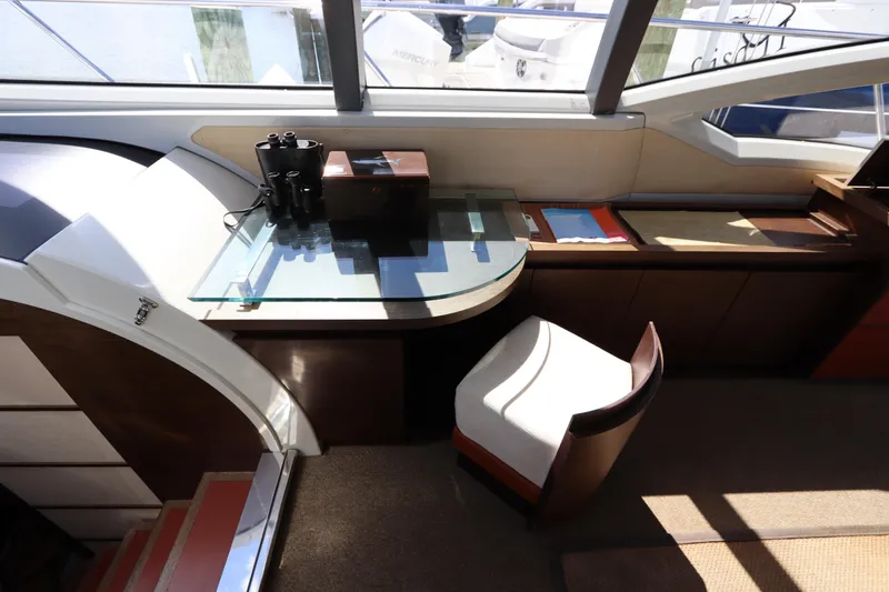 Slide: The Image of Interior of 2007 Azimut 62S yacht with modern desk and chair setup. - 31