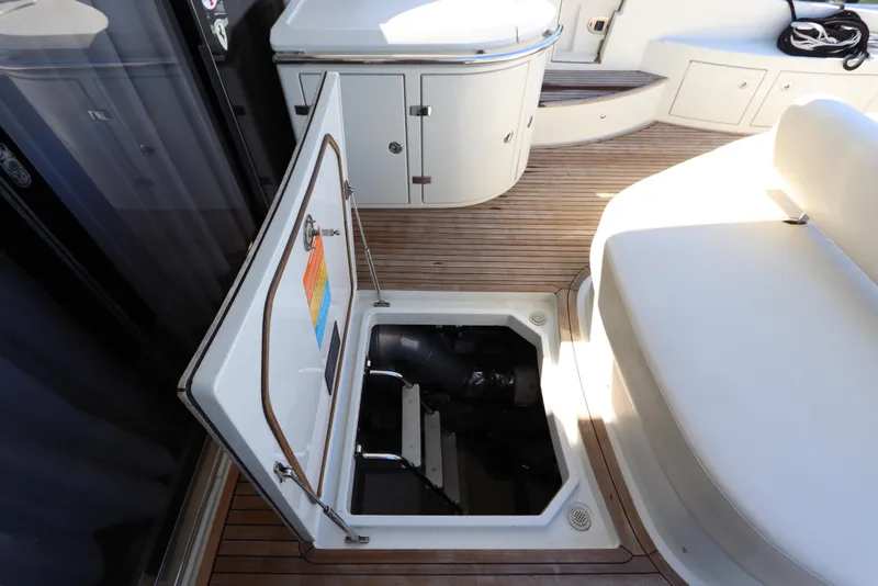 Slide: The Image of 2007 Azimut 62S yacht interior with open hatch on teak deck. - 6