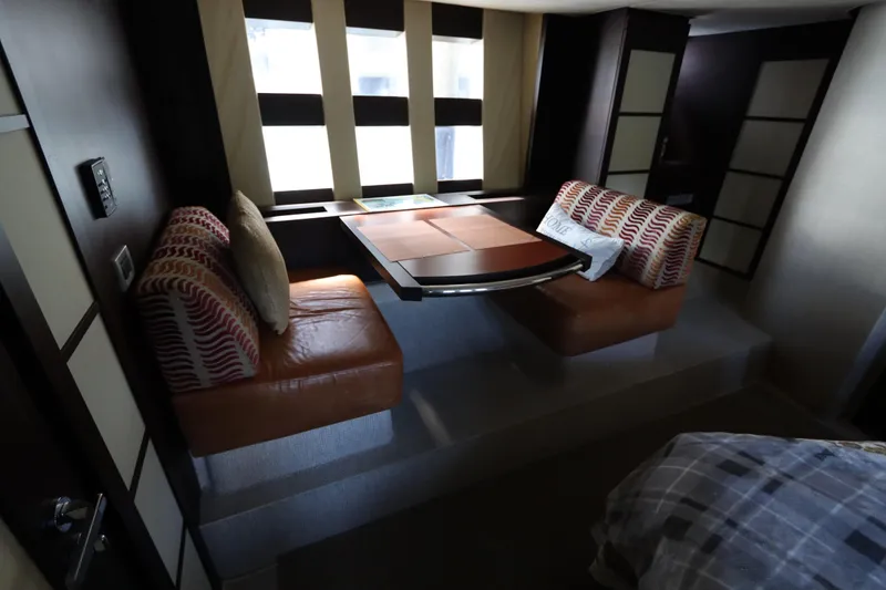 Slide: The Image of Luxurious interior of 2007 Azimut 62S yacht with cozy seating and modern design. - 63