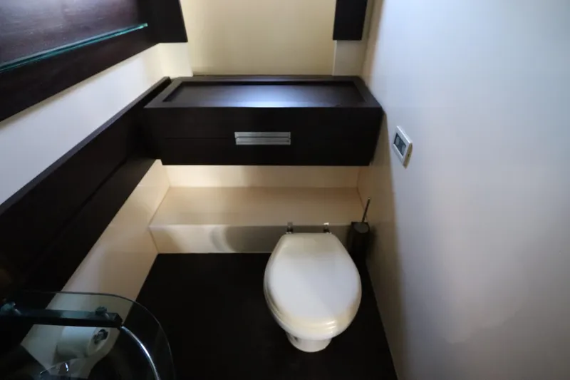 Slide: The Image of Luxury bathroom interior of 2007 Azimut 62S yacht, featuring modern fixtures and sleek design. - 67