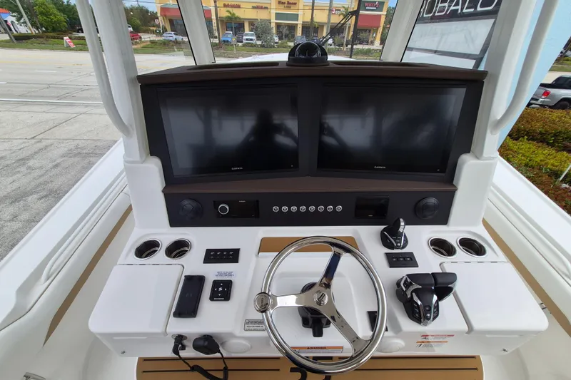 Slide: The Image of 2026 Regulator 35 boat model helm with modern displays. - 11