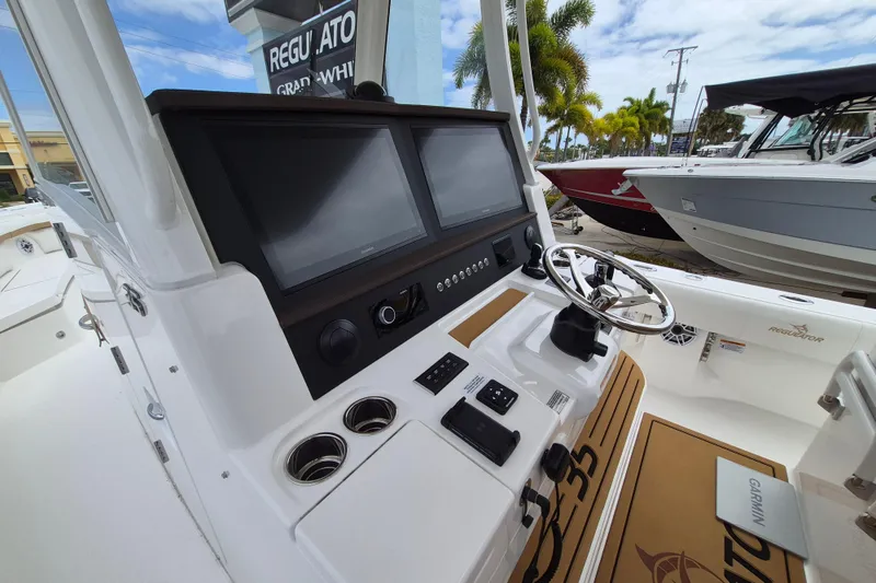 Slide: The Image of Regulator 35 boat console 2026 with modern navigation systems. - 12