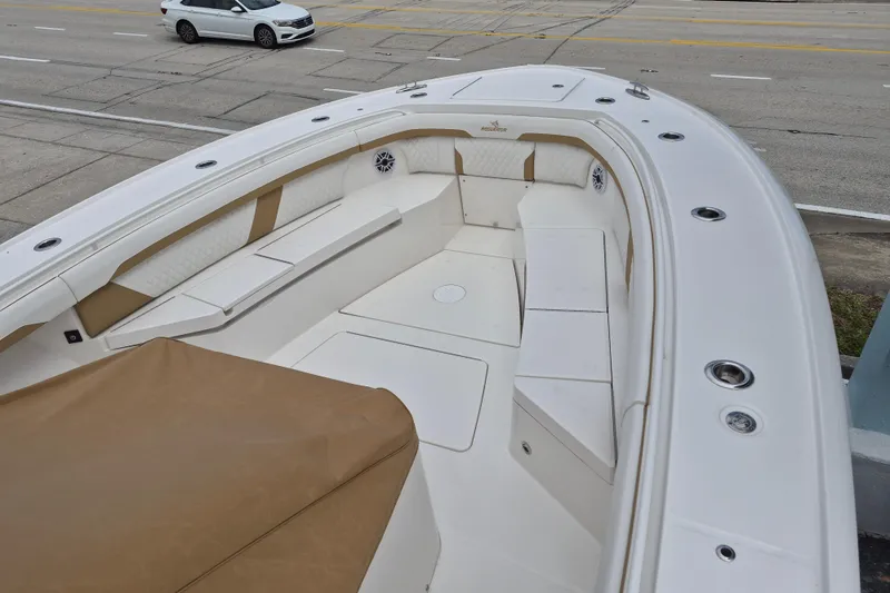 Slide: The Image of 2026 Regulator 35 boat with spacious deck and seating area. - 13