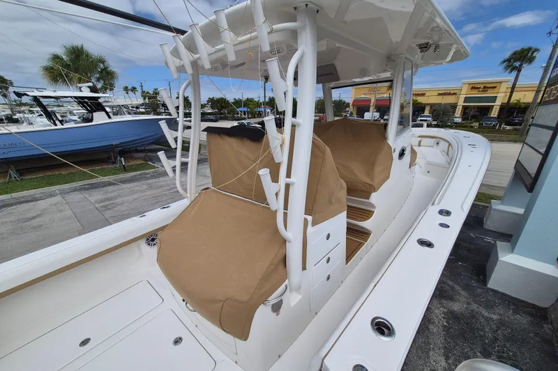 Slide: The Image of Regulator 35 boat 2026 with covers at the dock. - 16