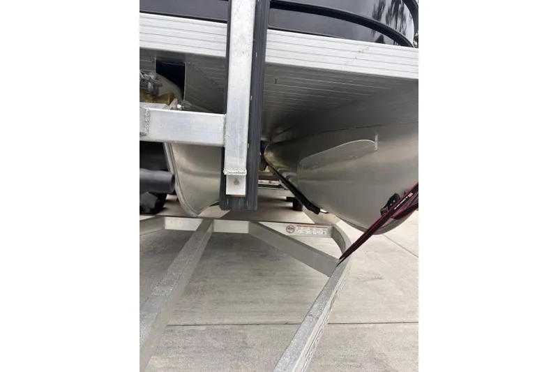 Slide: The Image of 2022 Veranda Vista 22RC pontoon boat on trailer, side view. - 12