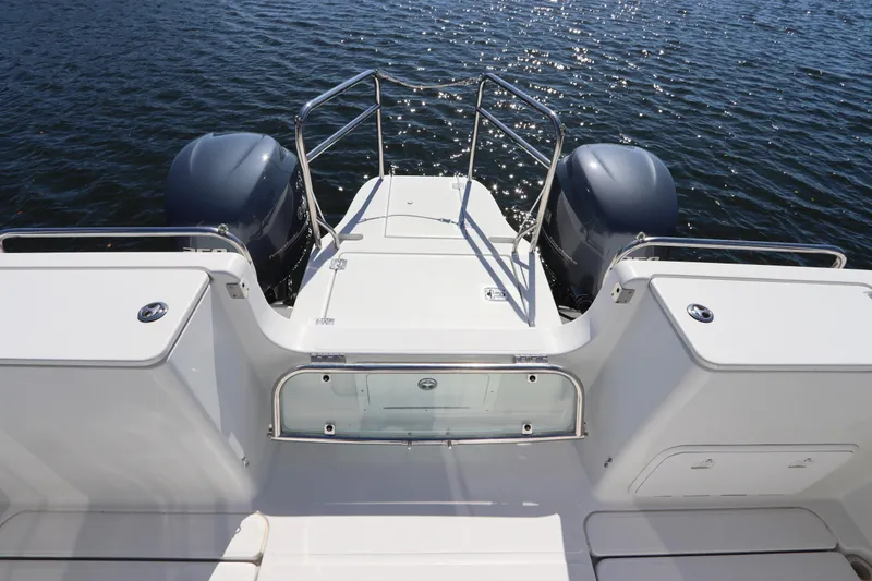 Slide: The Image of 2008 Glacier Bay 3080 Coastal Runner boat with dual engines on water. - 10