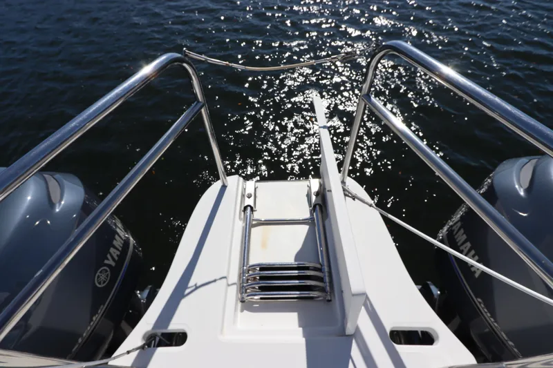 Slide: The Image of 2008 Glacier Bay 3080 Coastal Runner boat with Yamaha engines on sparkling water. - 11