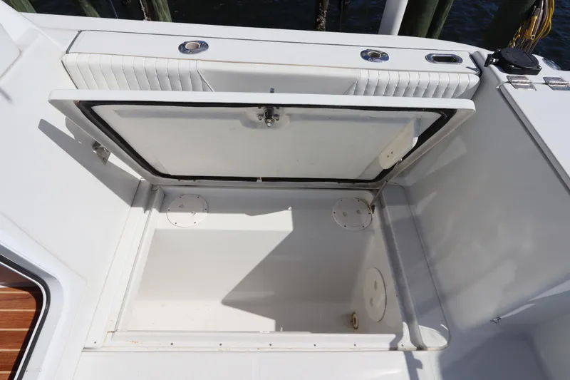 Slide: The Image of Open storage compartment on 2008 Glacier Bay 3080 Coastal Runner boat. - 16