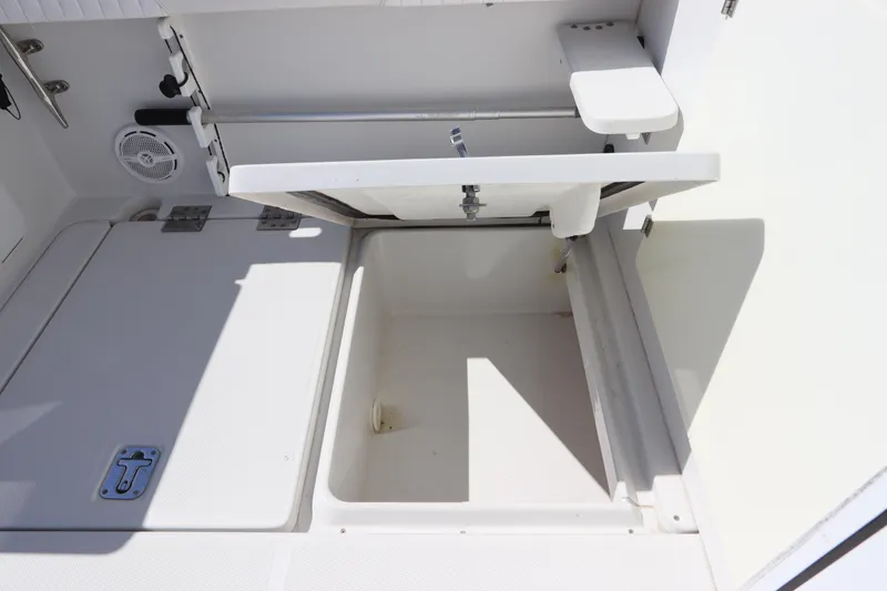 Slide: The Image of Open storage compartment on 2008 Glacier Bay 3080 Coastal Runner boat. - 21