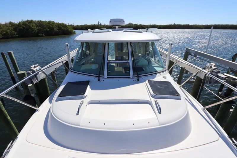 Slide: The Image of 2008 Glacier Bay 3080 Coastal Runner boat docked on a sunny day. - 27