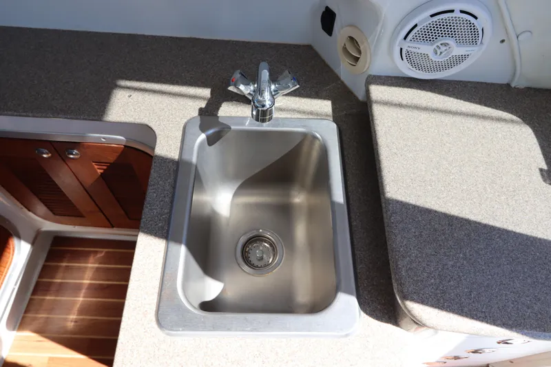 Slide: The Image of Stainless steel sink in 2008 Glacier Bay 3080 Coastal Runner boat kitchen. - 36