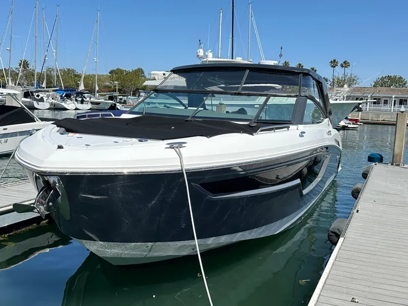 The Image of A 2021 Cruisers Yachts 38 GLS docked. It features a sleek, modern design. - 0