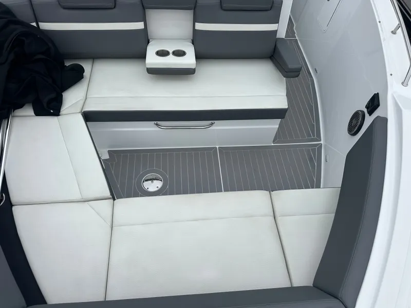 Slide: The Image of The 2021 Cruisers Yachts 38 GLS features a stylish seating area with gray and white upholstery. - 23