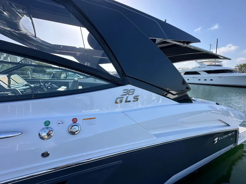 Slide: The Image of The 2021 Cruisers Yachts 38 GLS is docked, featuring sleek design and a glossy finish. - 31
