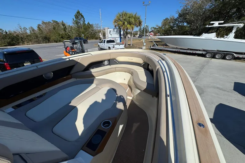 Slide: The Image of 2026 Chris-Craft Catalina 31 boat interior with luxurious seating and cup holders. - 20