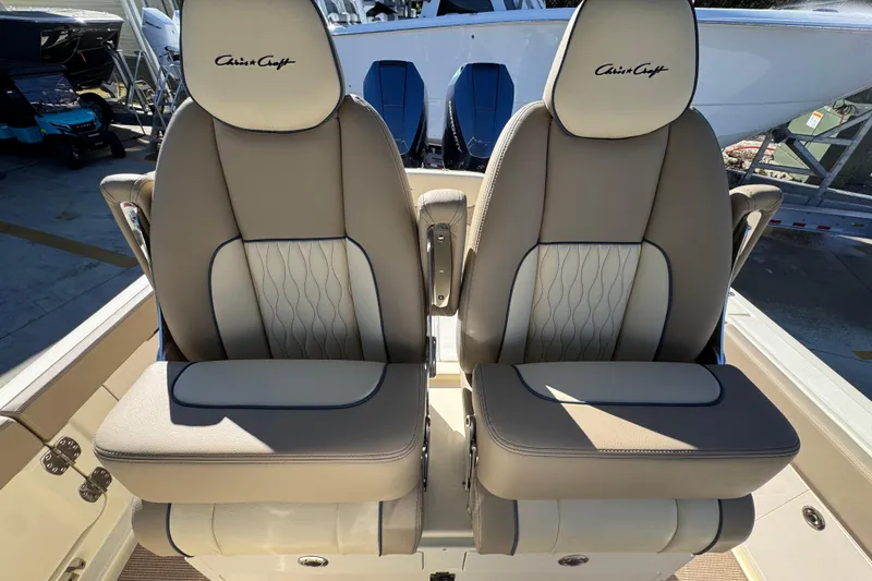 Slide: The Image of 2026 Chris-Craft Catalina 31 boat seats, luxurious design with beige and cream upholstery. - 35