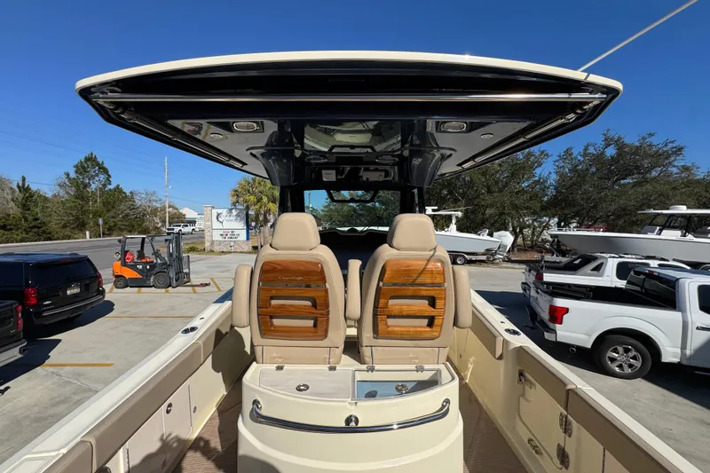 Slide: The Image of 2026 Chris-Craft Catalina 31 boat interior with seating and overhead canopy. - 43