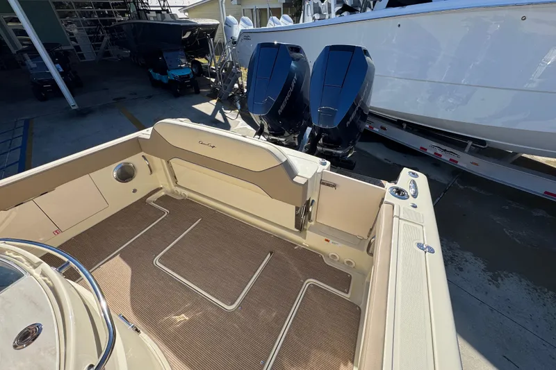 Slide: The Image of 2026 Chris-Craft Catalina 31 boat interior with twin Mercury outboard engines. - 46