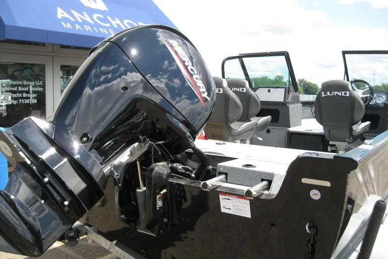 Slide: The Image of 2025 Lund 1875 Impact XS Sport boat with Mercury engine at Anchor Marine. - 5
