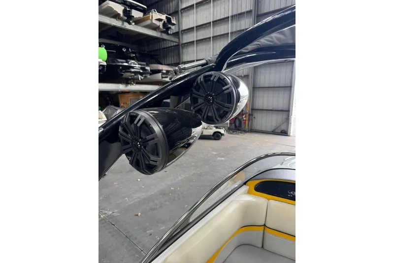 Slide: The Image of 2005 Malibu Wakesetter VLX boat speakers in a storage facility. - 27