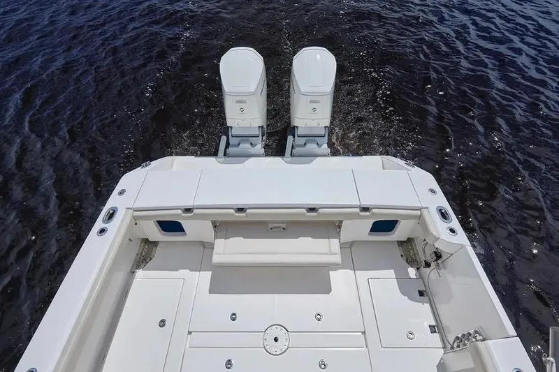 Slide: The Image of 2022 Solace 41 CS boat with dual engines on open water. - 20