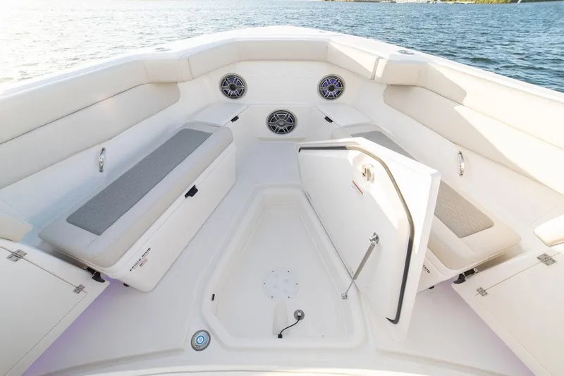 Slide: The Image of Manufacturer Provided Image: 2022 Solace 41 CS boat interior with seating and storage compartments. - 4