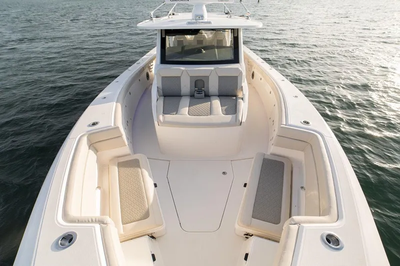 Slide: The Image of Manufacturer Provided Image: 2022 Solace 41 CS boat with spacious seating on calm water. - 5