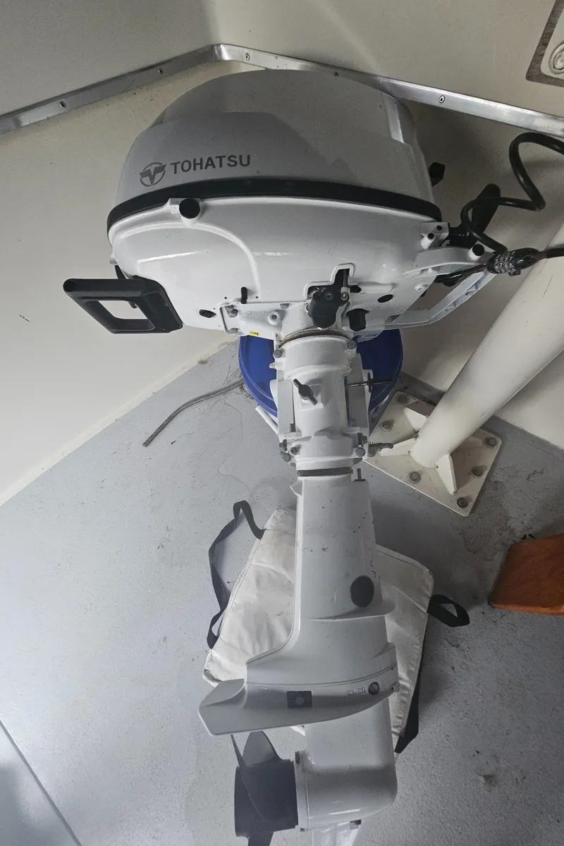 Slide: The Image of Tohatsu outboard motor on a 1978 Tollycraft 37 Sport Sedan boat. - 33