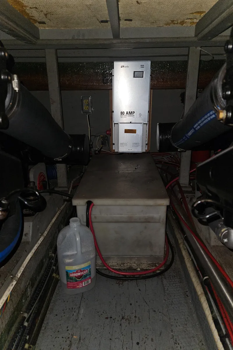 Slide: The Image of Engine room of 1978 Tollycraft 37 Sport Sedan with equipment and wiring. - 34